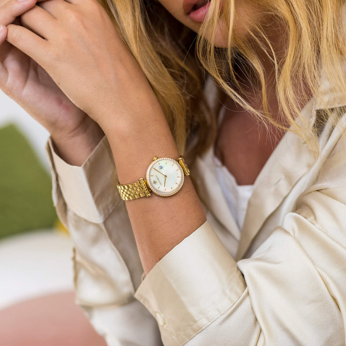 The Luxe Gold watch worn on the wrist alternate